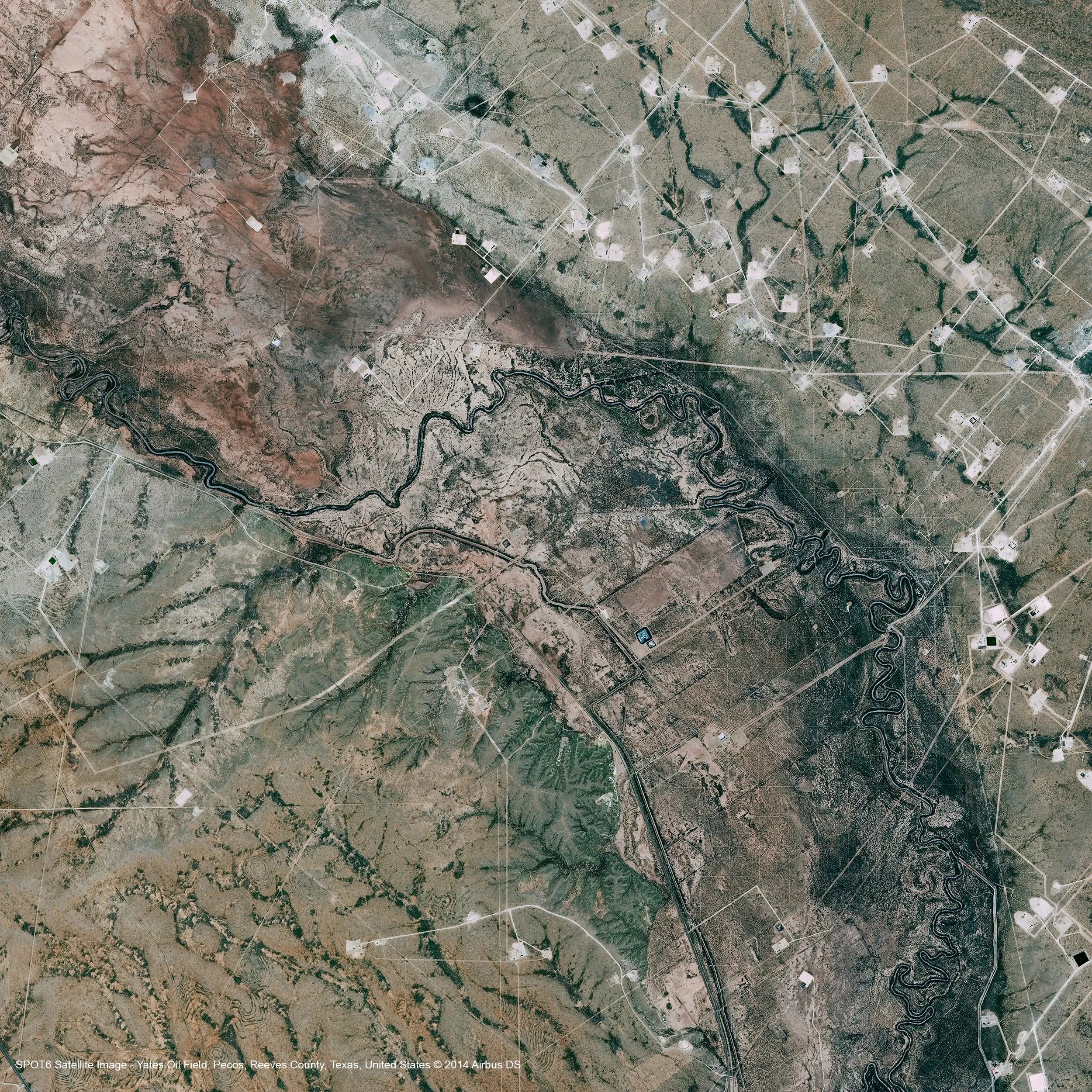 High-resolution satellite image of an oil field