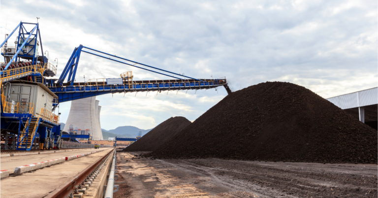 Featured Image Estimating Stockpile Volumes From Satellite Imagery Methods Accuracy and Best Practices - SkyWatch Large conveyor belts moving coal piles